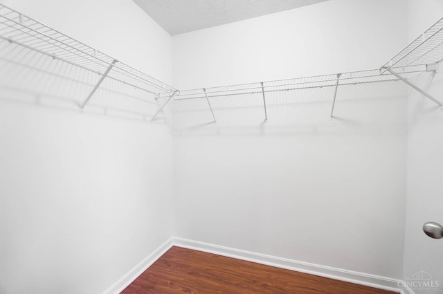 818 William Howard Taft Rd, Cincinnati, OH 45206 - spacious closet featuring dark wood-style floors