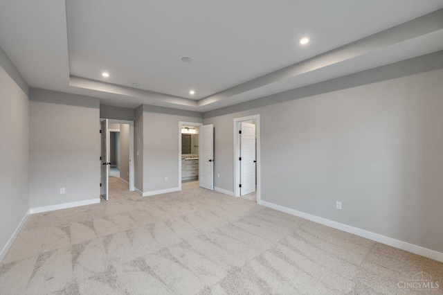 7230 Abington Way Unit 21805, West Chester, OH 45069 - unfurnished bedroom with recessed lighting, light colored carpet, a raised ceiling, and ensuite bathroom