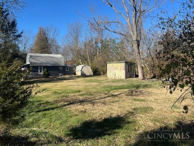 338 Wiltsee Ave, Miami Twp, OH 45140 - view of grassy yard featuring a shed