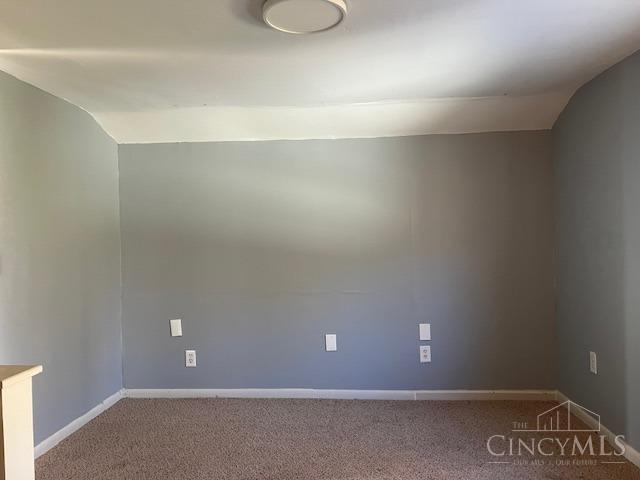 338 Wiltsee Ave, Miami Twp, OH 45140 - carpeted spare room with lofted ceiling and baseboards