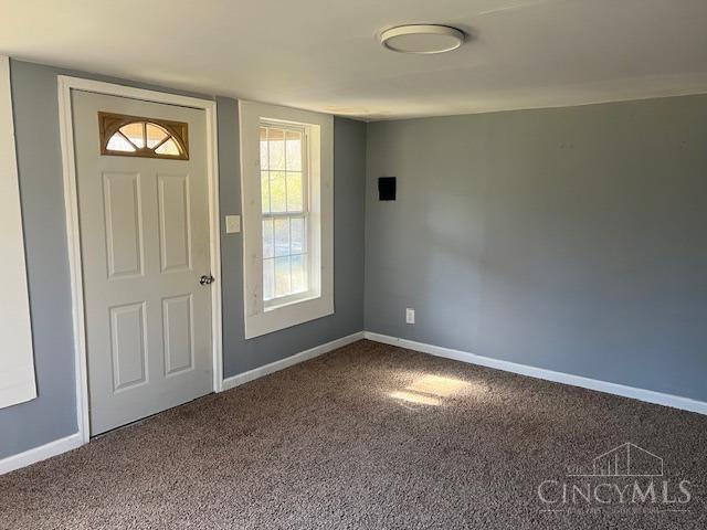 338 Wiltsee Ave, Miami Twp, OH 45140 - foyer entrance with dark carpet and baseboards