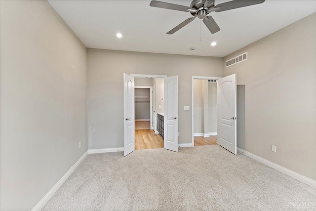 4517 Renaissance Park Dr, Middletown, OH 45005 - unfurnished bedroom featuring light colored carpet, baseboards, ceiling fan, and recessed lighting