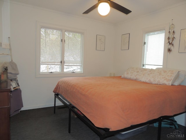 770 Sutton Rd, Anderson Twp, OH 45230 - bedroom with crown molding, dark carpet, and a ceiling fan