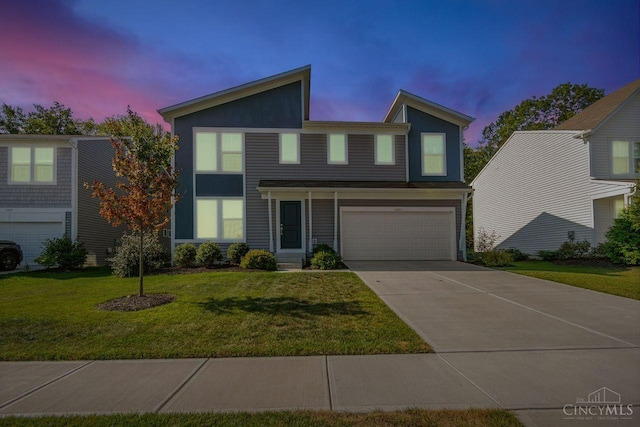 1295 Eagle Blvd, Hamilton Twp, OH 45039 - traditional-style home with an attached garage, concrete driveway, and a lawn