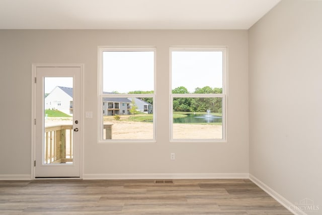 4147 Amelia Olive Branch Rd, Batavia Twp, OH 45103 - doorway to outside with wood finished floors and baseboards