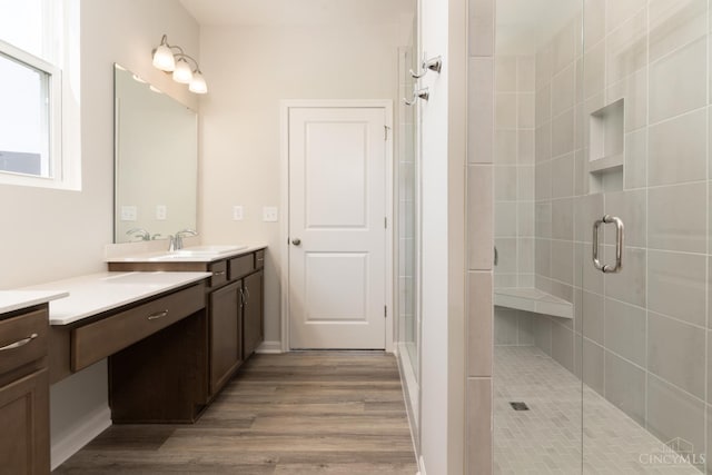 4147 Amelia Olive Branch Rd, Batavia Twp, OH 45103 - bathroom featuring vanity, a stall shower, and wood finished floors