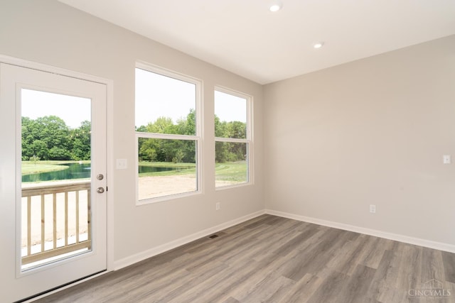 4147 Amelia Olive Branch Rd, Batavia Twp, OH 45103 - doorway to outside with wood finished floors, baseboards, and recessed lighting