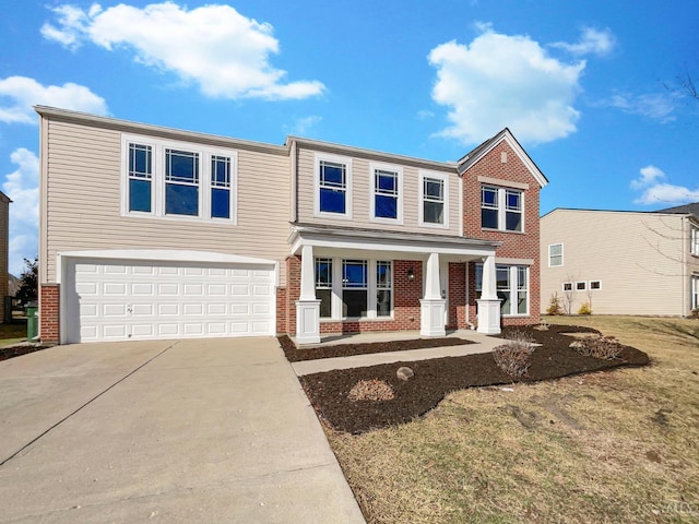 1789 Greentree Meadows Dr, Turtle Creek Twp, OH 45036 - view of front of house featuring brick siding, driveway, and an attached garage