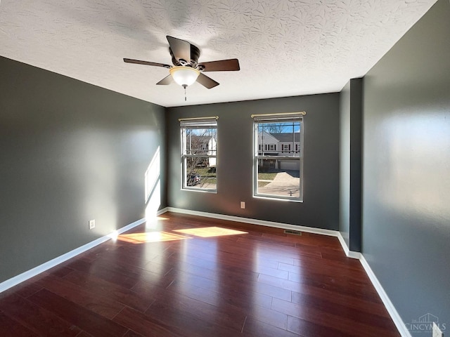 1789 Greentree Meadows Dr, Turtle Creek Twp, OH 45036 - spare room with visible vents, ceiling fan, a textured ceiling, wood finished floors, and baseboards