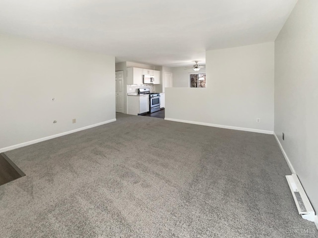 3044 Aries Ct, Colerain Twp, OH 45251 - unfurnished living room featuring ceiling fan and dark colored carpet