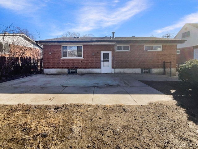 3044 Aries Ct, Colerain Twp, OH 45251 - back of house with brick siding and a patio
