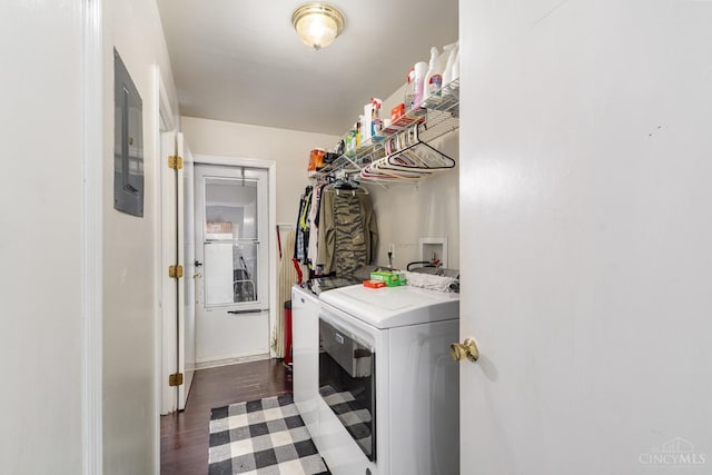 washroom featuring independent washer and dryer and dark wood-type flooring