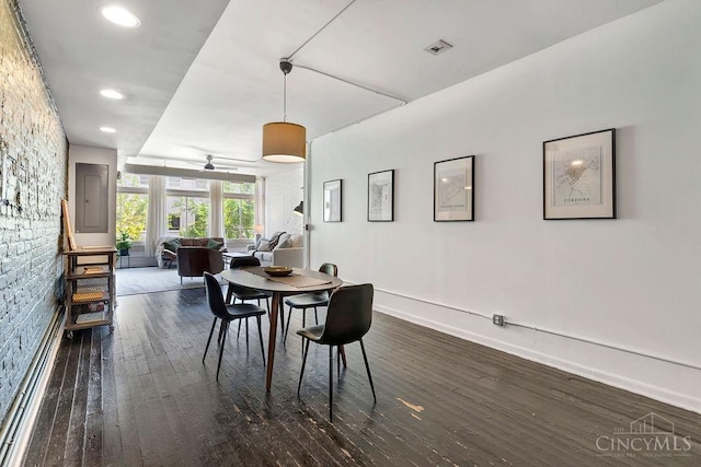 dining area featuring visible vents, baseboards, dark wood finished floors, and recessed lighting