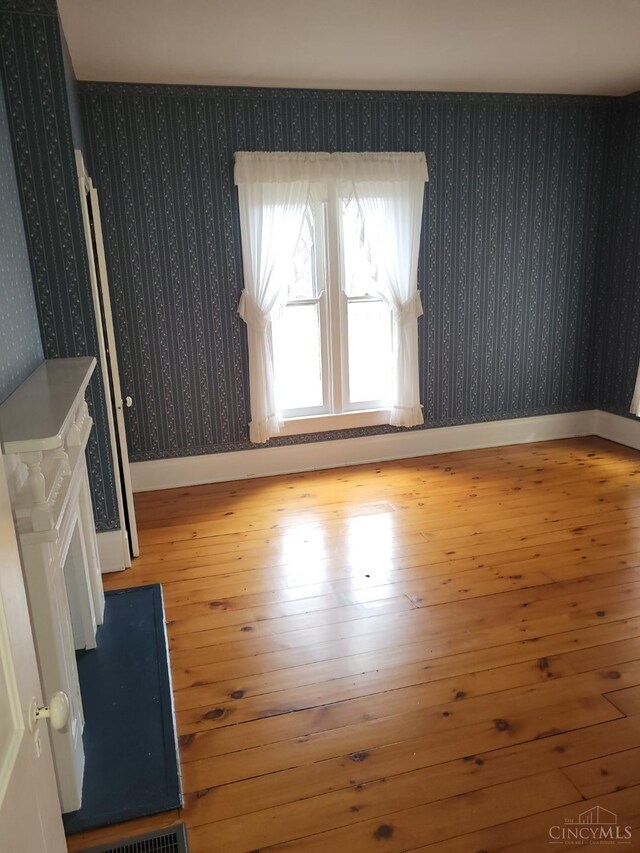 1144 Round Bottom Rd, Union Twp, OH 45150 - spare room with hardwood / wood-style flooring and baseboards