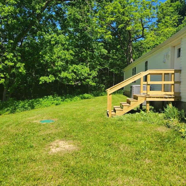 5103 Washburn Rd, Brushcreek Twp, OH 45133 - view of grassy yard featuring stairway and a deck