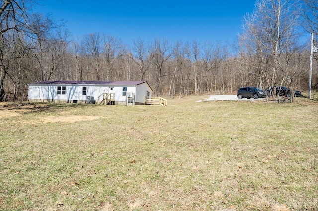 5103 Washburn Rd, Brushcreek Twp, OH 45133 - view of grassy yard featuring a view of trees