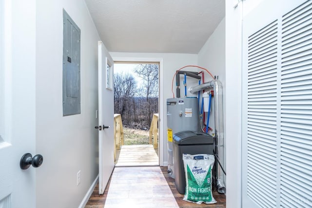 5103 Washburn Rd, Brushcreek Twp, OH 45133 - utility room with a heating unit, electric panel, and water heater