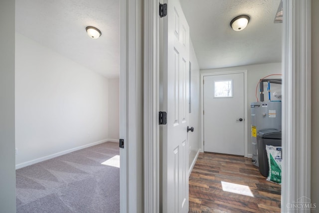5103 Washburn Rd, Brushcreek Twp, OH 45133 - entryway featuring electric water heater, baseboards, and a textured ceiling