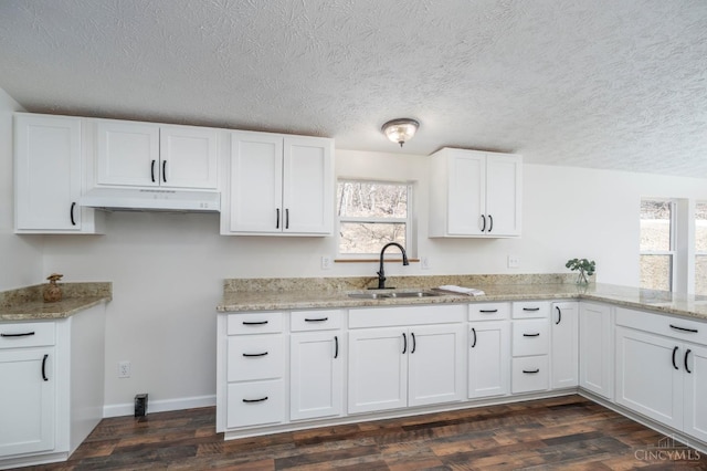 5103 Washburn Rd, Brushcreek Twp, OH 45133 - kitchen featuring a sink, light stone counters, white cabinetry, and a textured ceiling