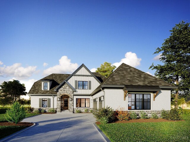 view of front facade featuring brick siding, board and batten siding, driveway, and roof with shingles