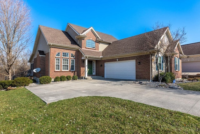 view of front of house with a front lawn, an attached garage, brick siding, and driveway