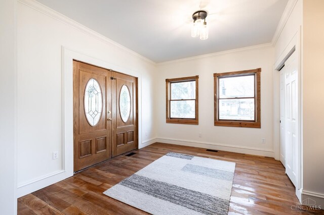 6114 Reily Millville Rd, Reily Twp, OH 45056 - foyer with baseboards, wood finished floors, visible vents, and ornamental molding