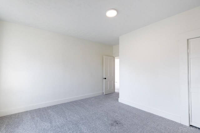 6114 Reily Millville Rd, Reily Twp, OH 45056 - empty room featuring baseboards and carpet
