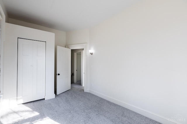 6114 Reily Millville Rd, Reily Twp, OH 45056 - unfurnished bedroom with a closet, baseboards, and carpet