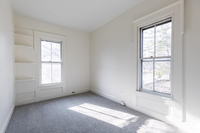 6114 Reily Millville Rd, Reily Twp, OH 45056 - unfurnished room featuring plenty of natural light, baseboards, and carpet floors