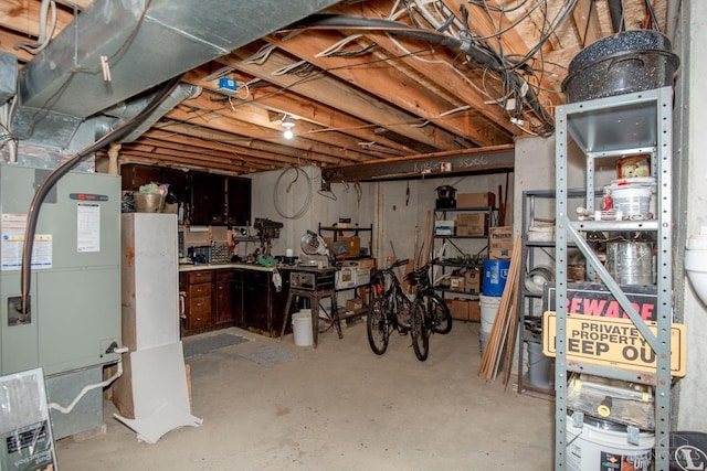 343 Whiteoak Dr, Wilmington, OH 45177 - unfinished below grade area with a workshop area and heating unit