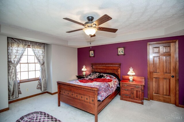 343 Whiteoak Dr, Wilmington, OH 45177 - bedroom featuring light carpet, baseboards, and ceiling fan