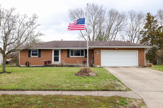 single story home with a front lawn, driveway, brick siding, and an attached garage