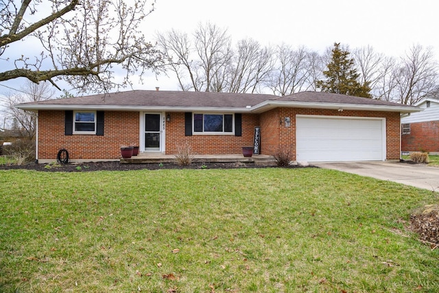 ranch-style home featuring brick siding, driveway, and a garage