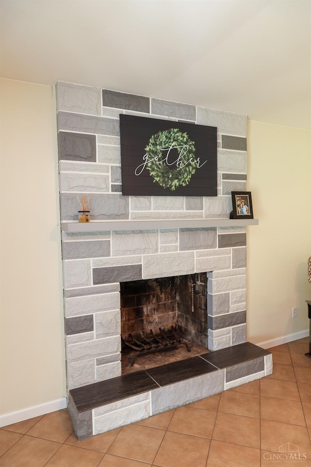 room details with a fireplace and baseboards