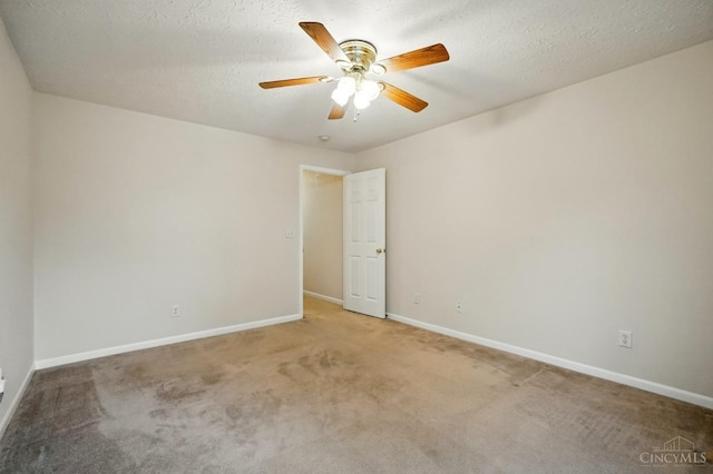 7918 Jessies Way Unit 201, Fairfield Twp, OH 45011 - spare room featuring carpet, baseboards, and ceiling fan