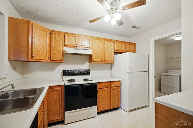7918 Jessies Way Unit 201, Fairfield Twp, OH 45011 - kitchen featuring washer / clothes dryer, electric range, freestanding refrigerator, under cabinet range hood, and a sink