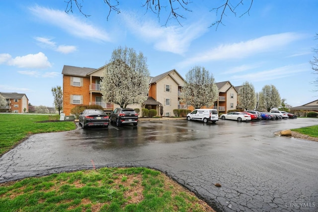 7918 Jessies Way Unit 201, Fairfield Twp, OH 45011 - view of asphalt road featuring a residential view