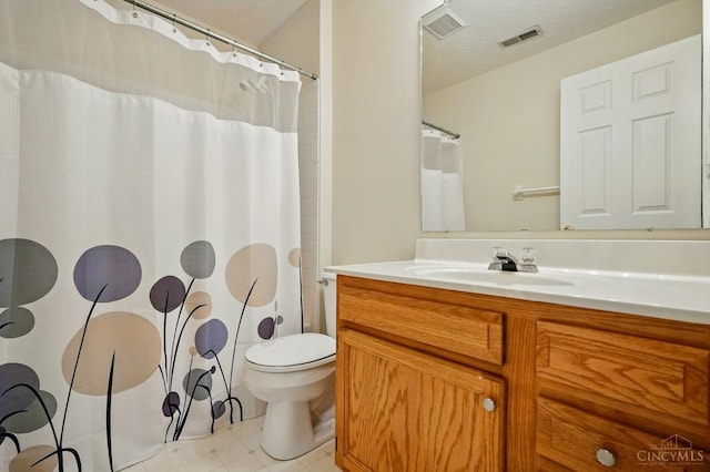 7918 Jessies Way Unit 201, Fairfield Twp, OH 45011 - full bath with vanity, toilet, tile patterned floors, and a shower with curtain