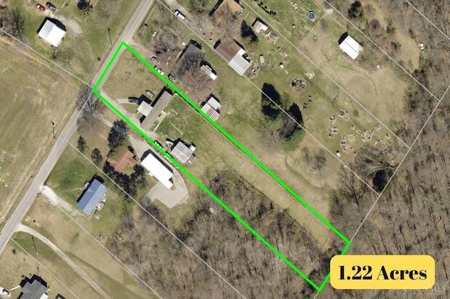 aerial map of property and surrounding area with property parcel outlined