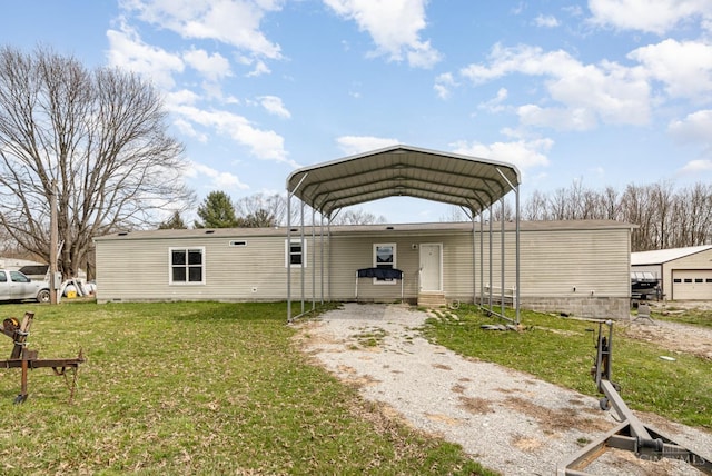 view of vehicle parking featuring driveway and a detached carport