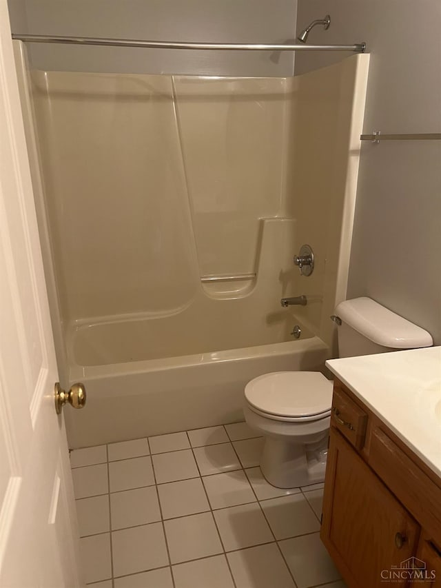 3701 W Galbraith Rd Unit 52, Colerain Twp, OH 45247 - full bathroom with tile patterned floors, vanity, toilet, and tub / shower combination