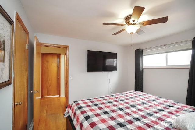 5826 Willow Oak Ln, Green Twp, OH 45239 - bedroom featuring wood finished floors and ceiling fan