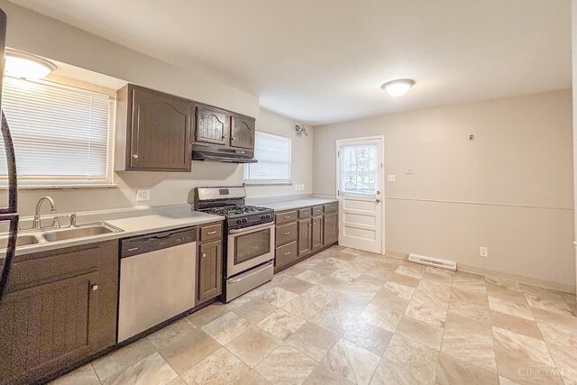 3236 Deborah Ln, Green Twp, OH 45239 - kitchen featuring visible vents, a sink, light countertops, appliances with stainless steel finishes, and under cabinet range hood
