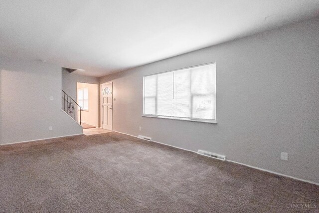 3236 Deborah Ln, Green Twp, OH 45239 - unfurnished room featuring a wealth of natural light, visible vents, and stairs