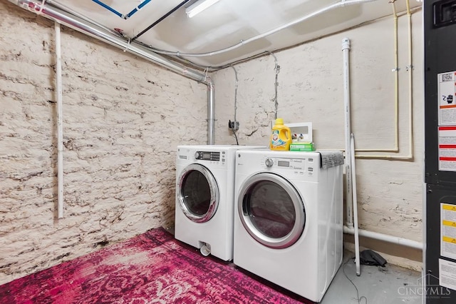 laundry area featuring laundry area and separate washer and dryer