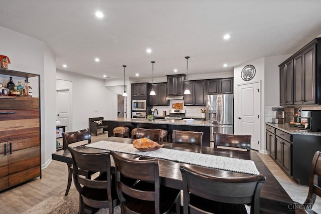 1113 Clover Field Dr, Miami Twp, OH 45140 - dining area featuring recessed lighting and light wood-style flooring