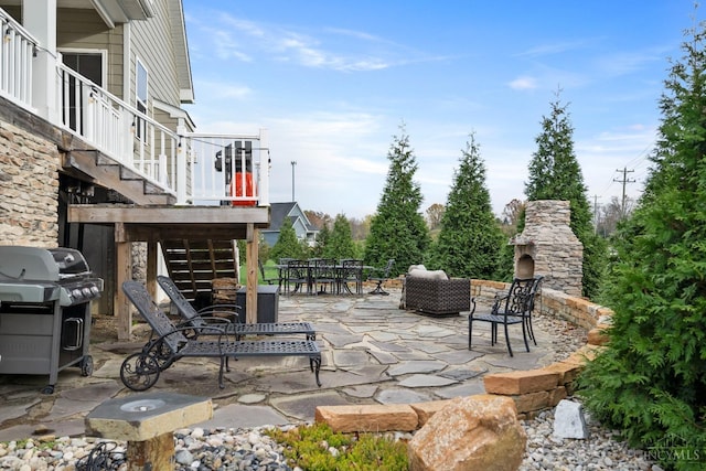 1113 Clover Field Dr, Miami Twp, OH 45140 - view of patio with grilling area, outdoor dining space, and stairs