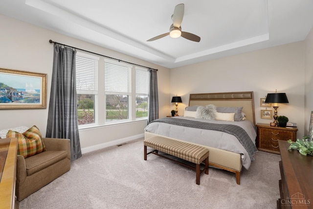 2612 Virgie Ct, Deerfield Twp, OH 45140 - carpeted bedroom featuring baseboards, a ceiling fan, a tray ceiling, and visible vents