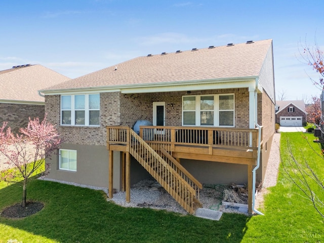 2612 Virgie Ct, Deerfield Twp, OH 45140 - back of house featuring a lawn, brick siding, stairs, and a deck