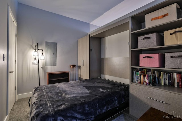 carpeted bedroom featuring electric panel and baseboards